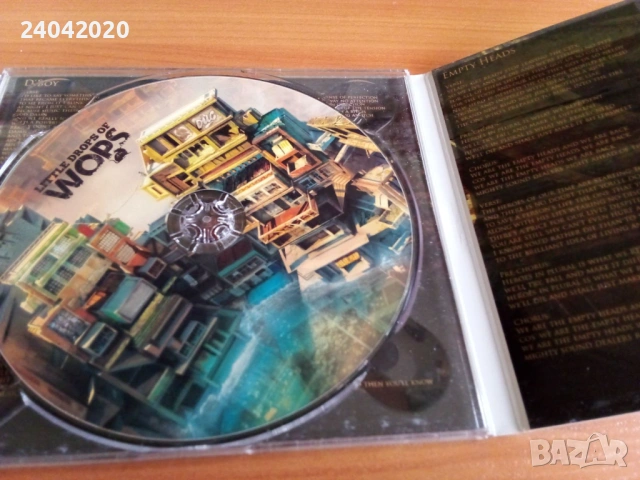 W.O.P.S. - Little Drops of WOPS БГ Рок оригинален диск, снимка 2 - CD дискове - 54280920