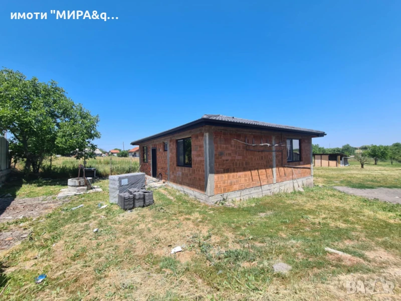 НОВОПОСТРОЕНА ЕДНОЕТАЖНА КЪЩА С ПАРЦЕЛ 2 015 кв.м., снимка 1