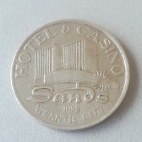 Жетон. Token. 1 Dollar. 1982.  Hotel & Casino. Sands. Atlantic city. Хотел & казино. 1 долар. , снимка 1 - Нумизматика и бонистика - 42548625