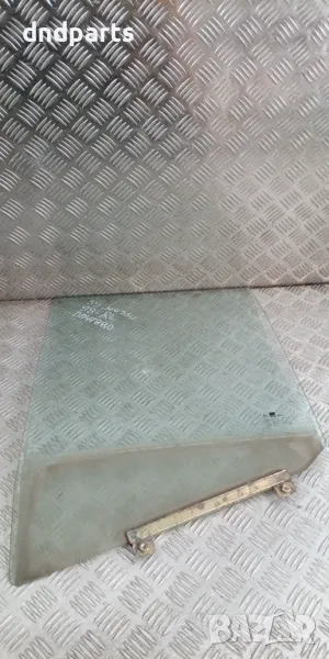 Стъкло врата SsangYong Musso 1998г.(задна лява)	, снимка 1