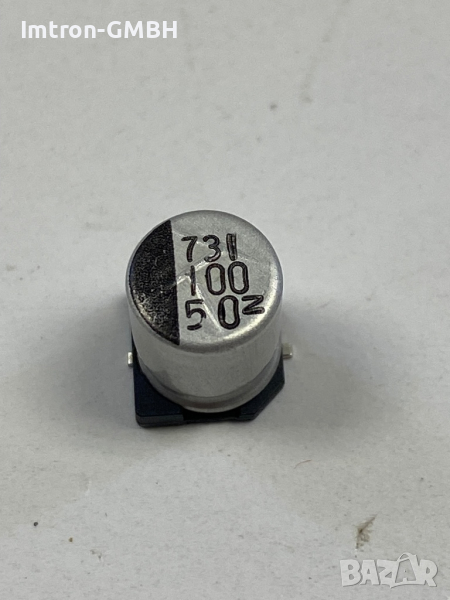 Алуминиеви електролитни кондензатори 	 NACZ101M50V8X10.5TR13F  100 µF 50 V , снимка 1