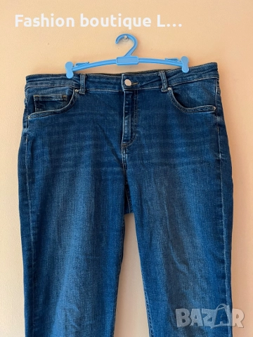H&M Дамски сини дънки 44 размер 70% памук 28% полиестер 2% еластант с джобове и ципове на крачолите , снимка 2 - Дънки - 52389271