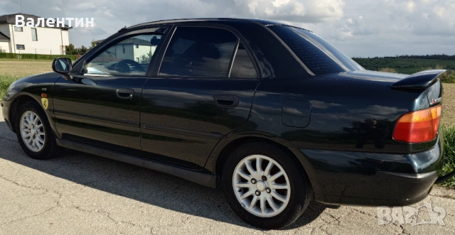 Продавам автомобил Mitsubishi Carisma  , снимка 8 - Автомобили и джипове - 54287441