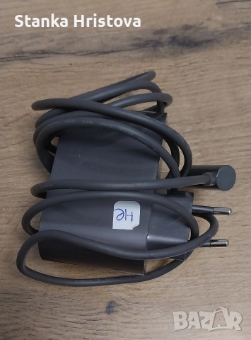Не работещо Зарядно за прахосмукачка Dyson. 