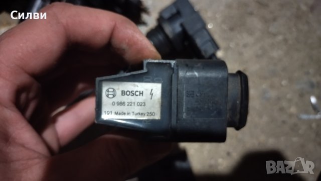 Оригинална запалителна бобина Bosch 0986221023 / VW AG 036905715 за VAG 1.2 1.4 1.6 Audi Seat Skoda, снимка 2 - Части - 44500659