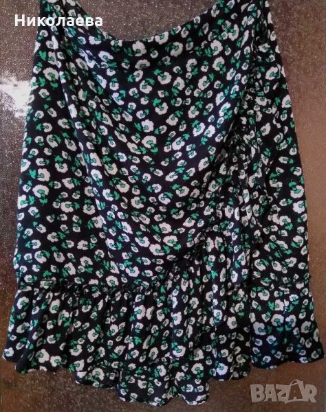 Къса пола с двупластова асиметрична предница с къдри,М/L, снимка 1