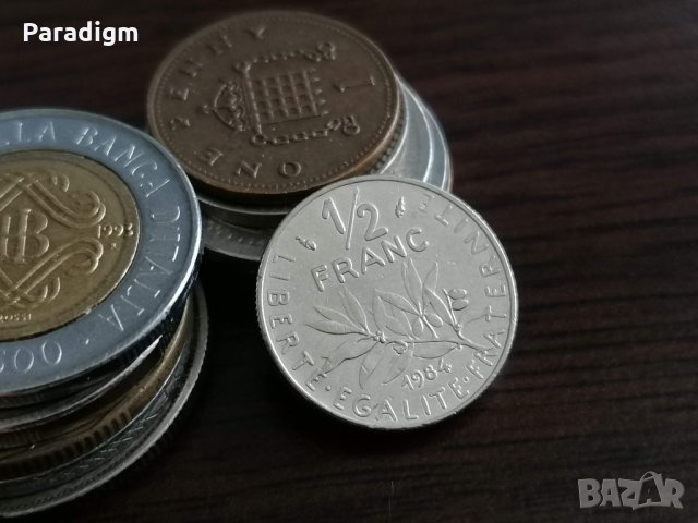 Монета - Франция - 1/2 (половин) франк | 1984г.