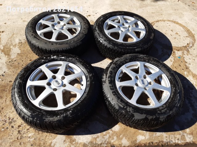 Зимни гуми  DUNLOP 4бр 195/65 R15 с лети джанти.