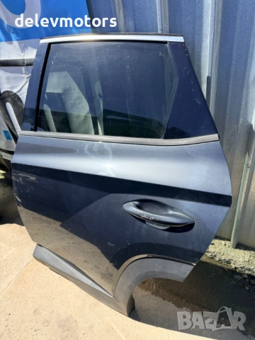 77004N7005 задна лява врата сива от Hyundai Tucson 1.6 T-GDi Hybrid, двигател G4FT 180 кс., 4x4