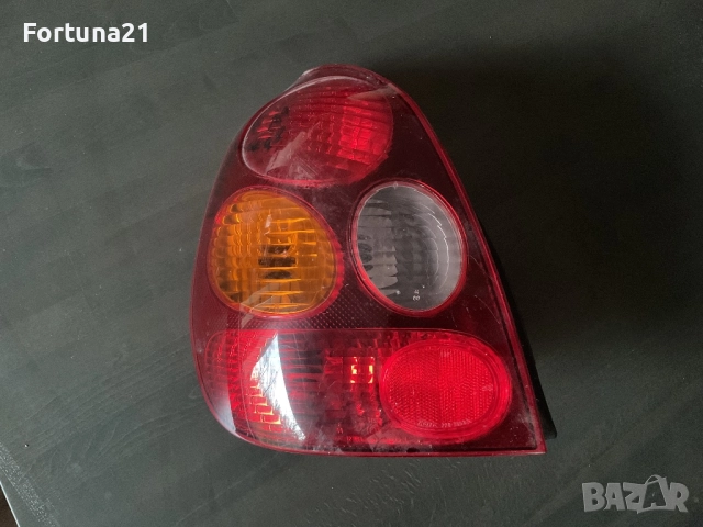 Toyota Corolla E110 - ляв стоп оригинален