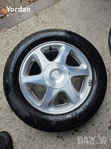 Лети джанти "15" 4х114 с нови гуми 185/65/15 Нисан Nissan, снимка 5 - Гуми и джанти - 52437450