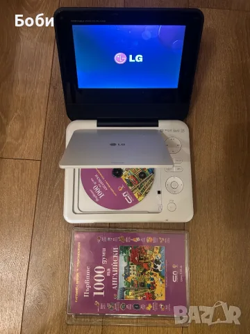 LG portable DVD player DP 450, снимка 4 - Плейъри, домашно кино, прожектори - 56302391
