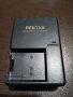 Оригинално зарядно Pentax D-BC108E за батерии D-Li-108, NP-45, EN-EL10, Li-42B/40B, снимка 1 - Батерии, зарядни - 32137459