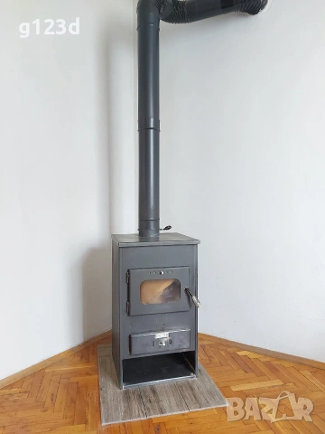 Камина за отопление за дърва с подарък кюнци