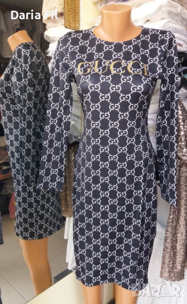 Стилна черна рокля на бели фигури с надпис от златисти камъчета, снимка 1