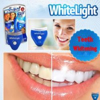 Уред  за избелване на зъби Whitelight