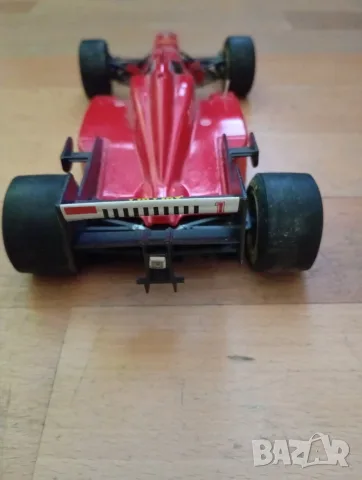 Ferrari F310 1996 Shell Schumacher - 1:20 - Maisto, снимка 8 - Коли, камиони, мотори, писти - 56073915