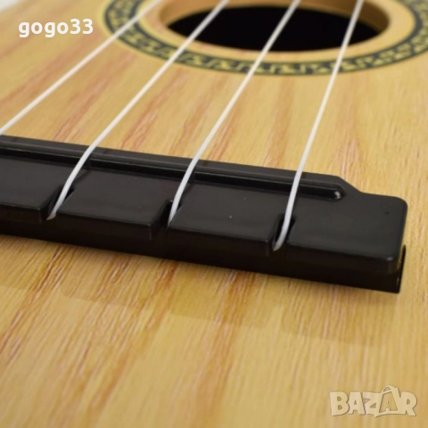 Детска мини китара Eddy Toys с 4 струни, снимка 2 - Музикални играчки - 47868297