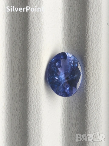 Танзанит 1.99 карата с швейцарски сертификат 