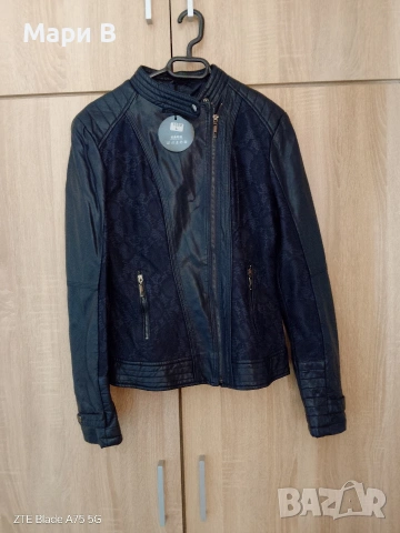 Ново кожено яке с етикет, размер между М-Л 