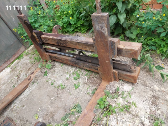 Виличен Позиционер, Изравнител с захват за маниту с вилици и хидравличнно изместване на вилиците