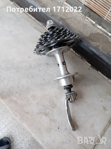 Задна главина и касета Shimano 600 Arabesque, снимка 3 - Части за велосипеди - 52361975