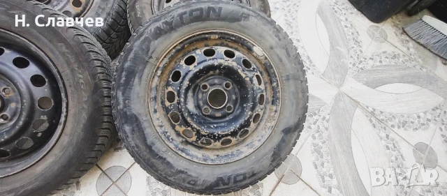 зимни гуми с джанти 4х100 /56,1, снимка 2 - Гуми и джанти - 50683266