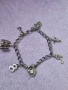 Антикварна сребърна гривна с талисмани , снимка 10