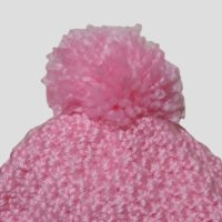 Детска безшевно ръчно плетена шапка за момиченце 4-8 год., снимка 4 - Шапки, шалове и ръкавици - 42257307