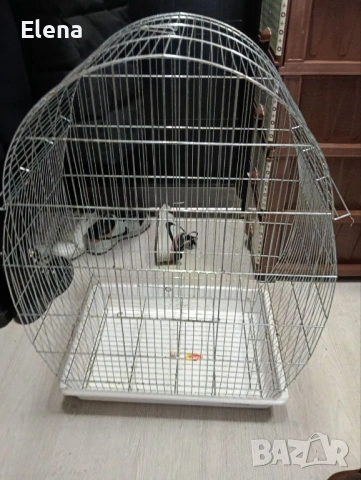 Клетка за папагал. Играчка като подарък