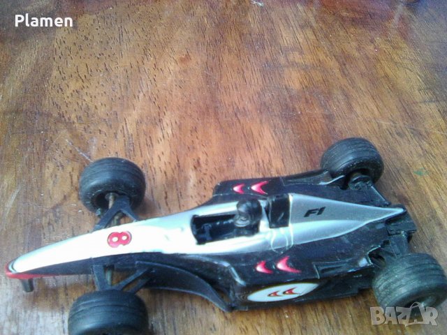 Модел на състезателна кола от Формула - 1, снимка 1 - Колекции - 38796378
