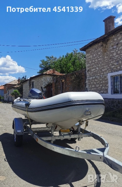 Лодка , мотор и колесар, снимка 1