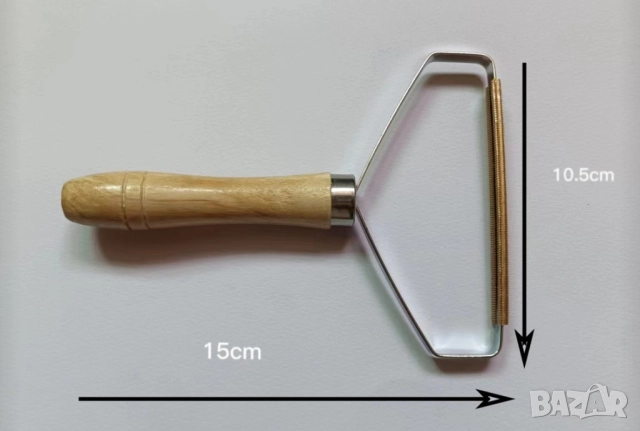   Ръчен уред за премахване на мъх и топчета от дрехи 