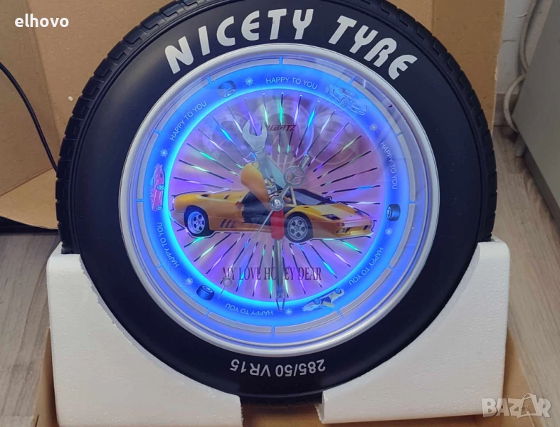 Часовник за стена във формата на гума, снимка 1