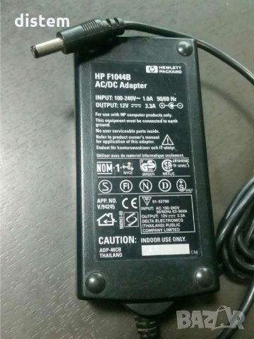 Оригинално зарядно устройство HP F1044B AC адаптер HP F1044B 12V 5A 60W , снимка 1 - Кабели и адаптери - 30589154