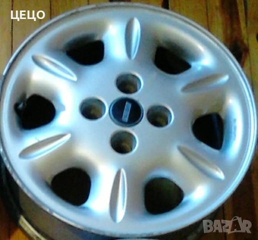 Алуминиеви джанти 14 " . С 4 бр зимни гуми . ИЗГОДНО !