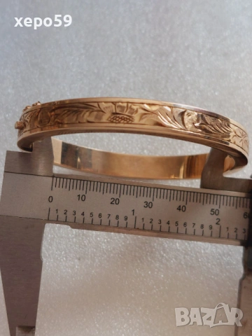 Златна дамска гривна,тип белезници,ръчна гравюра,20.60 гр. злато 333