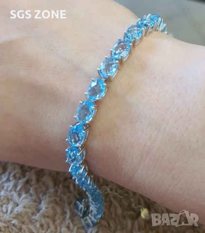 Сребърна гривна с фантастично изрязан Swiss Topaz 