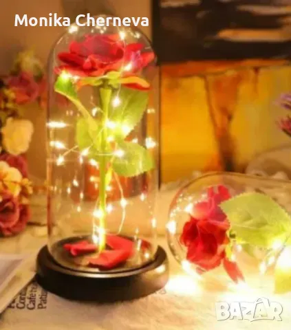 Красива осветена роза в стъкленица с красива подаръчна кутия