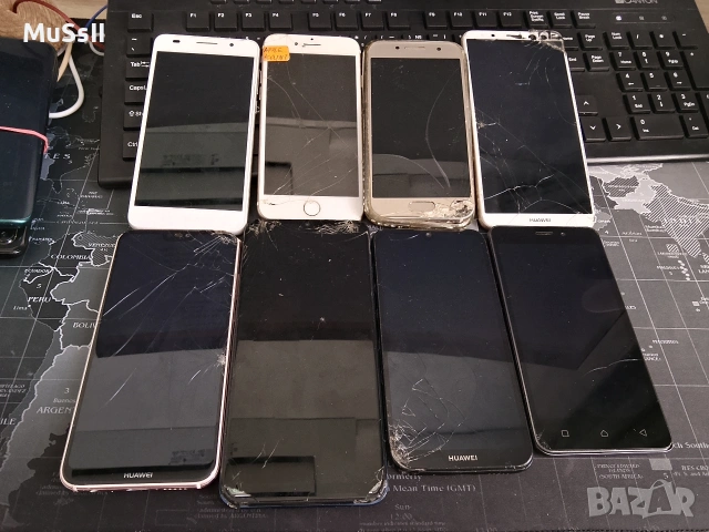 Телефони за части