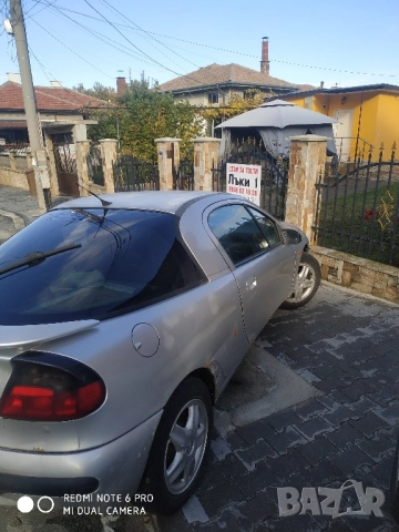 Опел Тигра 1.4 1999г, снимка 6 - Автомобили и джипове - 52172101