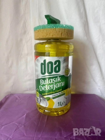 Doa препарат за миене на съдове с помпа и гъба с аромат на лимон 1000 мл.