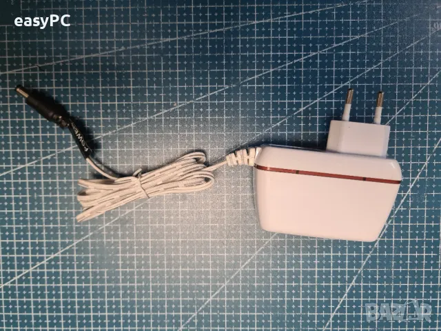 Оригинален захранващ адаптер UMEC DSL - EasyBox x02 15V 1.66A, снимка 3 - Рутери - 48226300
