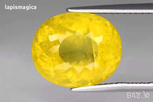 ЕЕстествен жълт апатит 7.2ct 12.7x10.7mm овална шлифовка