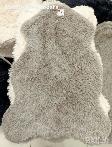 Кожено пухкаво рошаво килимче тип меча кожа, снимка 1