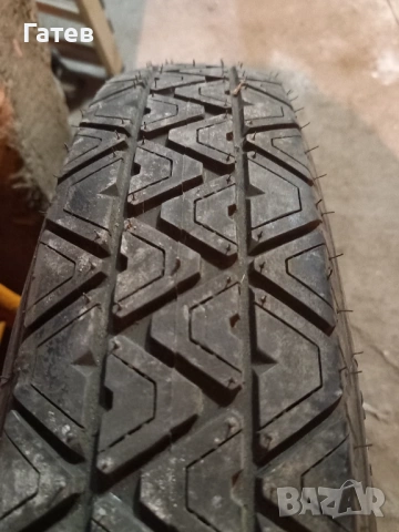 Патерица,резервна гума,оригинална неупотребявана за BMW 15", снимка 2 - Гуми и джанти - 53236428