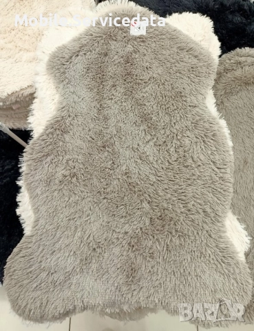 Кожено пухкаво рошаво килимче тип меча кожа