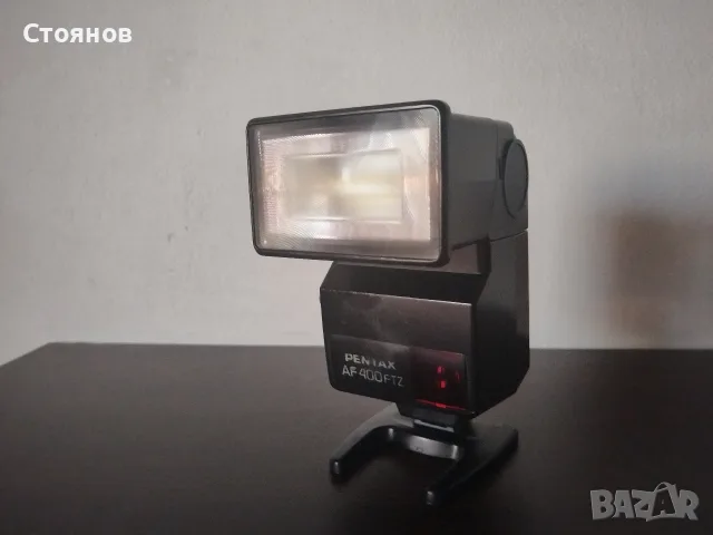 Светкавица PENTAX AF A400 FTZ, снимка 4 - Светкавици, студийно осветление - 56347469