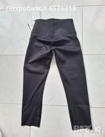 НОВИ с етикет Клин Nike Dri-FIT Go Women's XS- Клин Sportswear Essenti, снимка 4 - Клинове - 51517643