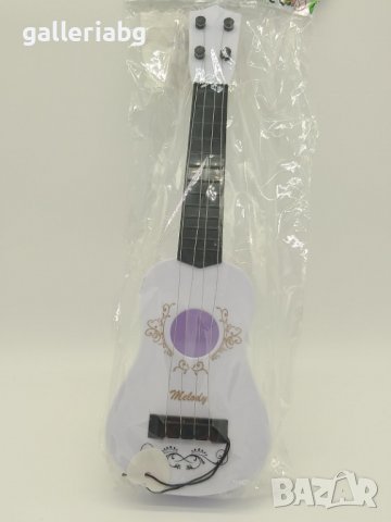Малка детска китара с перце, снимка 1 - Музикални играчки - 36661884